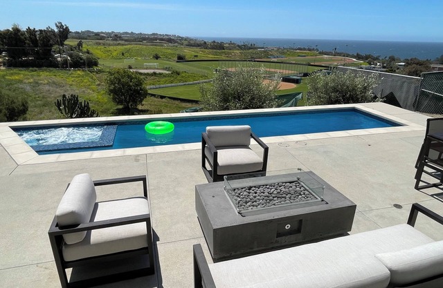 New construction modern home with ocean view and pool near Zuma in Malibu Park.