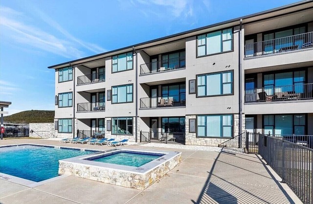NEW! First Floor Pool side PK Lake Luxury Condo - Hot Tub, FirePit, Gym, Laundry