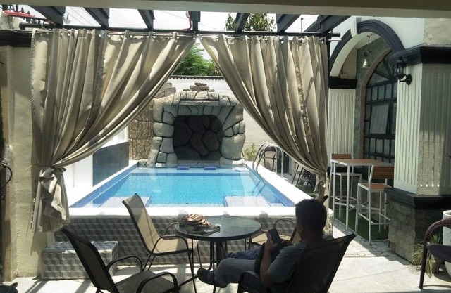 New Pool terrace with Fish pond. Outdoor movie entertainment for enjoyment.