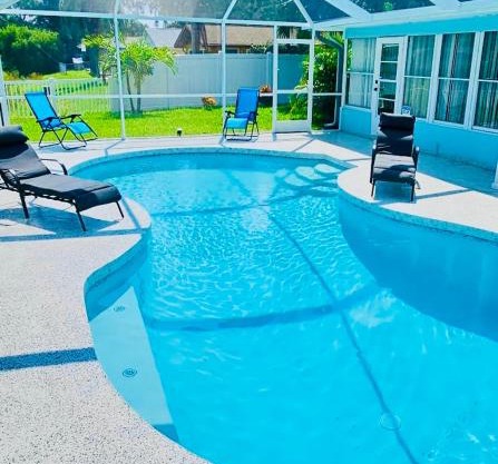 NEW Renovated luxury home with private heated pool, game room Near Anna Maria Island and IMG