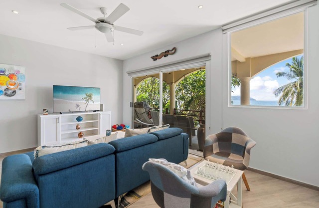 Newly Renovated Beachfront Condo with Inviting Minimalist Design, Pool & Balcony