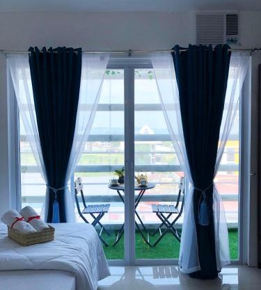 Next to SM Mall, Modern 1BR with Balcony & Pool