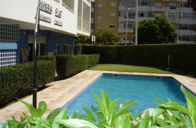 Nice Apartment with Pool , Balcony, Air Con 15 minutes from beach great location