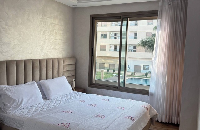 nn“Sunny 2BR Apartment in Bouznika – 2 min to Beach, A/C, WiFi, Family-Friendly”