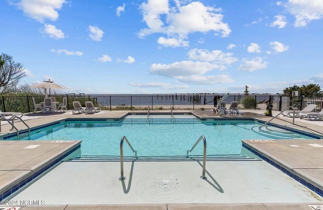 No Cleaning Fee! Brand New Double Queen Studio Condo w/Waterfront Pool + Beach