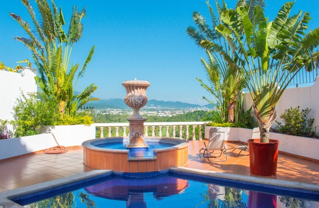 Ocean, mountain, valley, & golf course views. Walk to the beach.