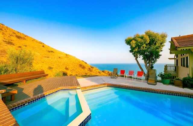 Ocean-view dog-friendly house with pool, hot tub, & sauna - snowbirds welcome