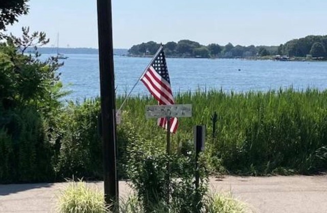 Ocean view home, steps to the beach in quiet Wickford neighborhood.