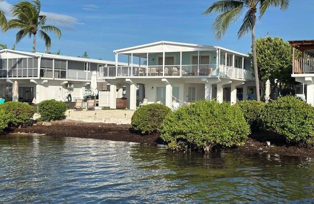 OCEANFRONT Home in Key Largo with golf cart. Leave your boat in your backyard