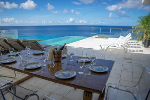Oceanfront Private Pier waterfront Caribbean sea Villa