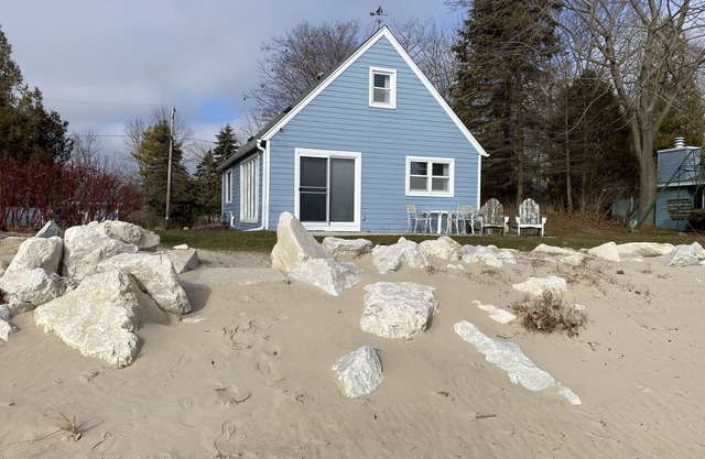 On the Shores of Lake Michigan with Breathtaking Views & A Beach Out Your Door!