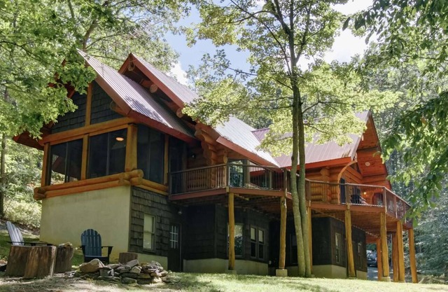 One of a Kind Log Home Tucked Away in the Woods!