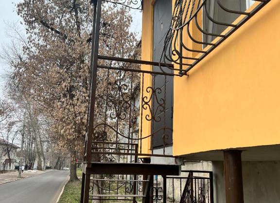 Orange House Next To a Park