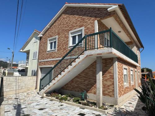 Outeiro House polo 1