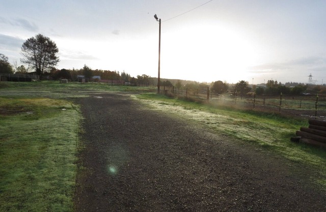 Overnight parking by horse barn in your RV or van.