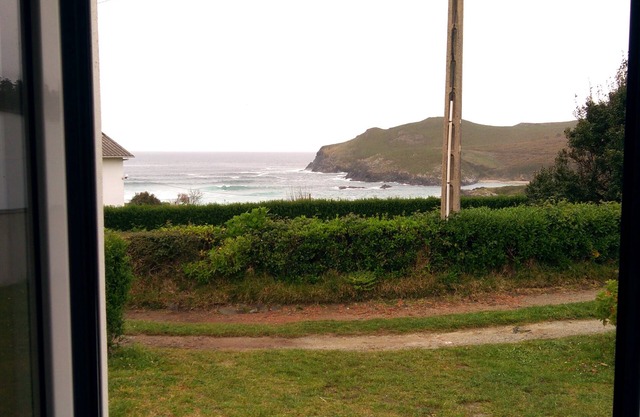 Painted beach house Pantín