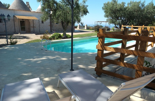 Panoramic trulli for 7 people in the hills with exclusive swimming pool 8 km from the sea