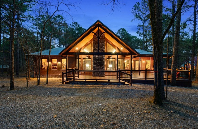 Patio in the Pines offers all of the luxuries in an absolutely stunning vacation cabin. One of the outstanding features is a HUGE 1,200 square foot covered outdoor living space with soaring ceilings, adorned with a wine barrel chandelier.