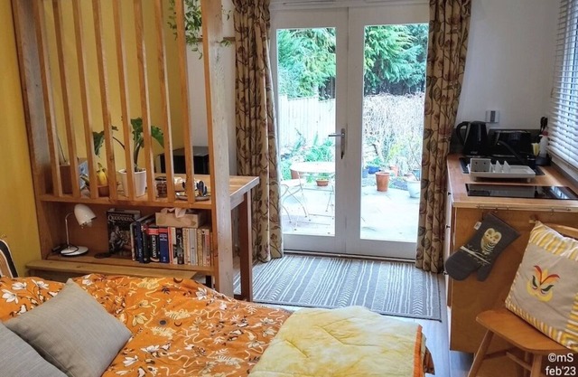 Peaceful separate annexe with bed, kitchen, shower room and patio area.