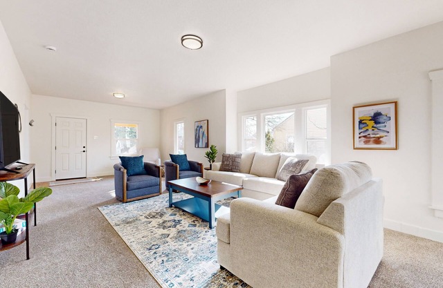 Perfectly located home with open layout, well-equipped kitchen, smart TV, & W/D