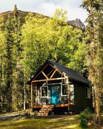 Picturesque Cabin Nestled Amidst Trees in Anchorage, Alaska