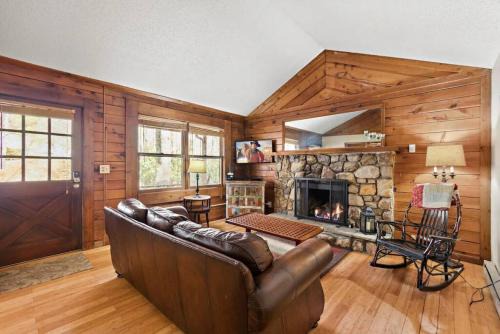 Picturesque Riverside Cabin with Fireplace and Porch