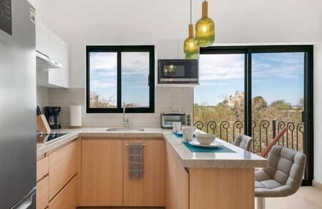 Pineda #301 TWO BR Suite Great Location ~ Rooftop ~ Parking