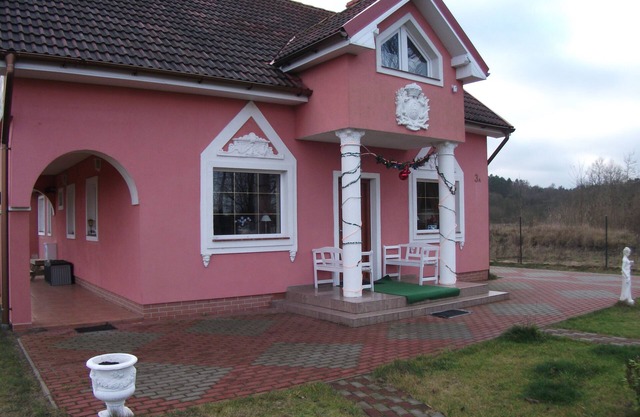 Pink holiday house 10 pers. between lagoon and heather in the bird sanctuary