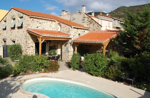 Pleasant stone house with private pool and modern comfort.