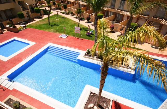 Pool view, centrally located, short walk to beach, bars and restaurants