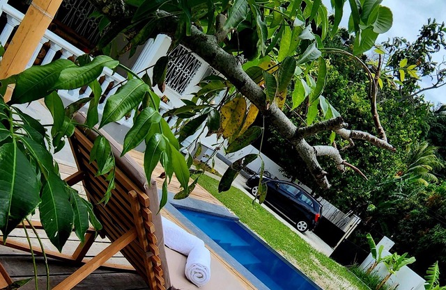 Pool villa in Beau Vallon with bamboo dining shelter