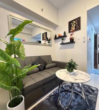 Primeworld Resort Style Cozy Condo Near Airport and Beaches