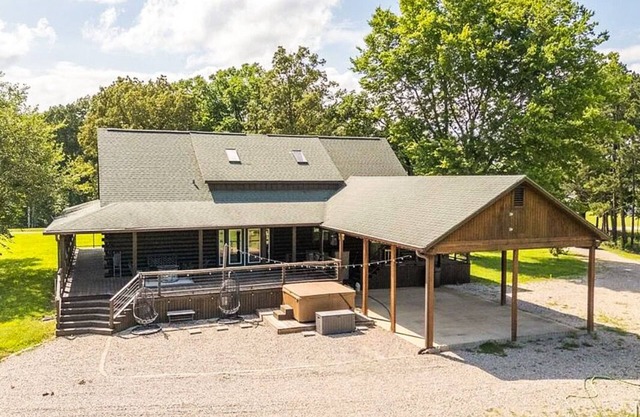 Private 5 BR cabin on 56 acres. Hot tub, Hunt, fish, and near the lake and town