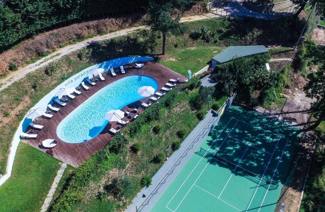 Private Estate with pool, tennis court and gym close to village.