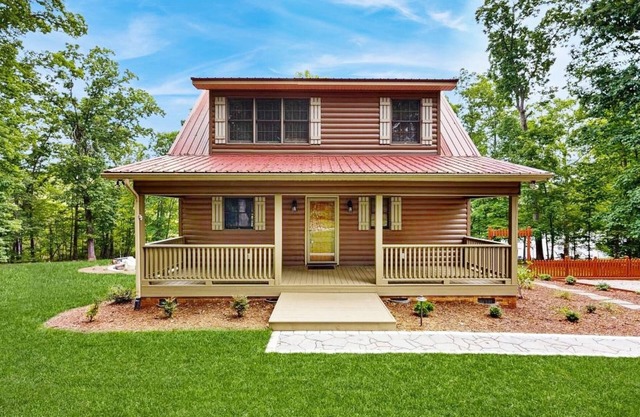 Private lakefront hideaway with dock, swing bench, remote work desk, & AC