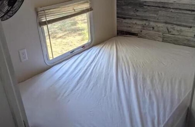Private waterfront bunkie cabin + RV trailer