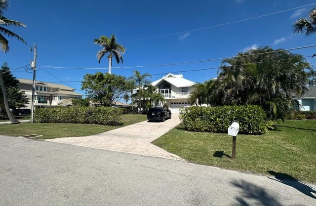 Private Waterfront home with pool and hot tub with large dock in Isle of Capri