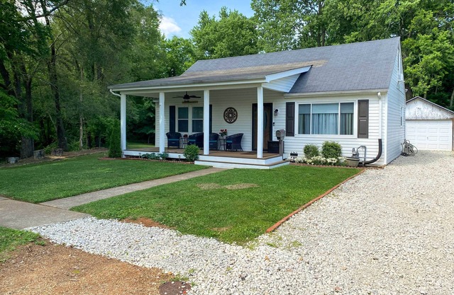 Quaint Creekside Cottage w/Porch & Backyard!