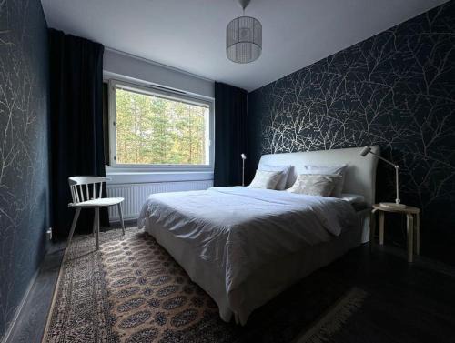 Rauhallinen ja tilava ylimmän kerroksen neliö