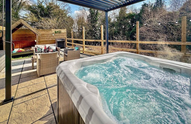 Recently upgraded to include Tilt and turn Gazebo over hot tub.