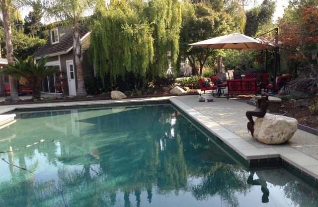 Relax in your private garden by the pool.