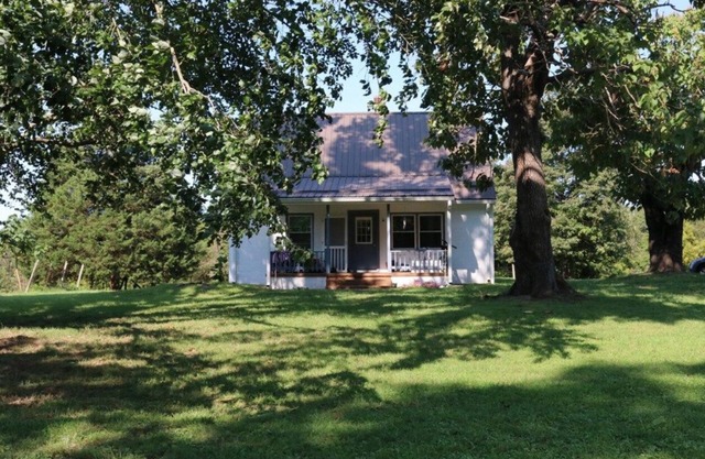 Renovated charming cape on a 72 acre retired farm