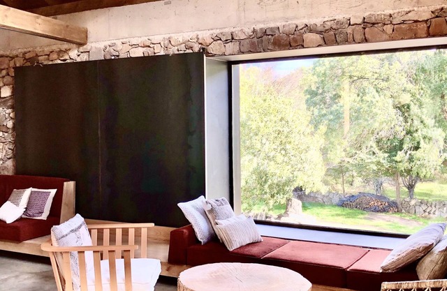 Renovated stone barn with terrace overlooking the countryside