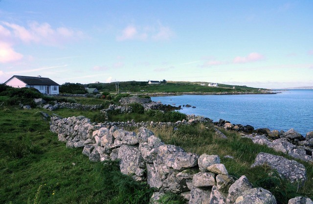 Right on the sea front bright bungalow with big secluded garden