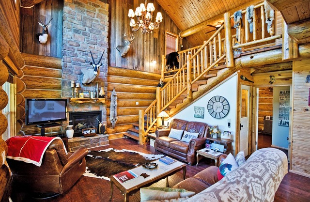Right on the water, stay at this Instagram photo-ready real LOG CABIN +Kayaks!
