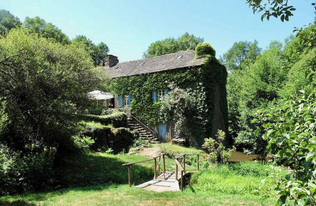 Romantic watermill in idyllic setting