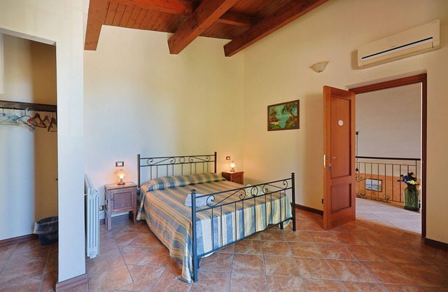 Room 'Lipari' with terrace, shared garden and air conditioning