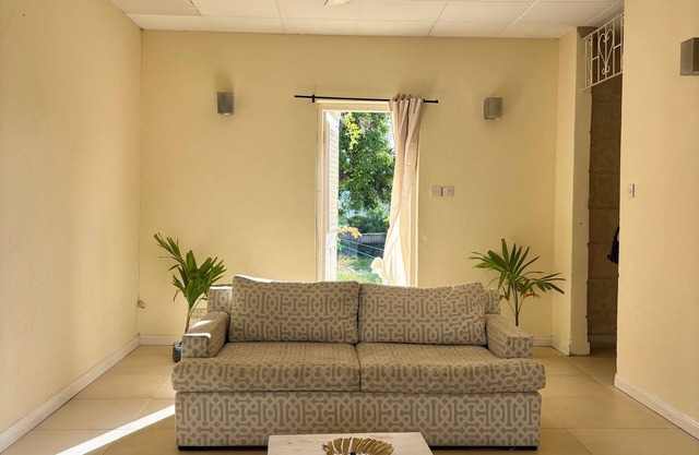 Room to Rent in Budget Friendly Bungalow with Island Breeze & Tropical Orchard