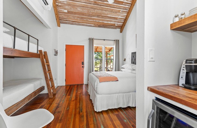 Room with One Queen and Two Twin Beds, Private Patio with Creek View