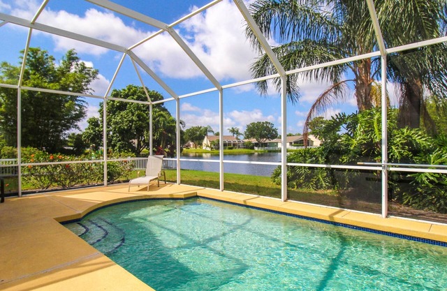 Sabal Harbour pool home with lake views - Harbour Happiness